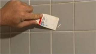 Bathroom Tiling : How to Remove Old Tile Adhesive From the Glazed Surface of Tiles