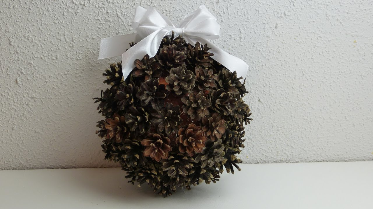 DIY How to make a Christmas ball with pine cones DIY World