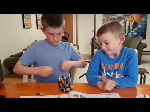 Isaiah and Samuel building lego technic set 42139 part 3