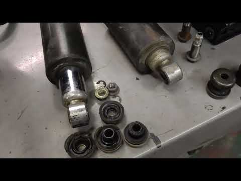 Replacing broken and worn out 2002 Harley OEM Softail shocks with Legend Suspension units.