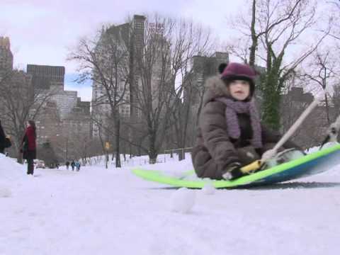 Sledding and skating in Central Park after vicious snow storm