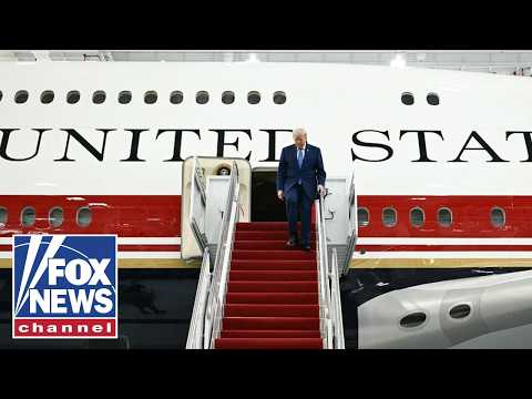 Air Force One lands in Palm Beach, Florida