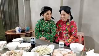 Two beautiful young girls happily ate, drank, sang and responded to each other on the small scree...