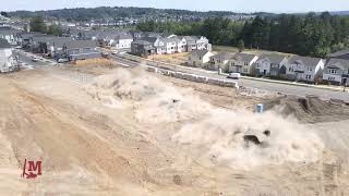 Blasting within 250 feet of a housing development