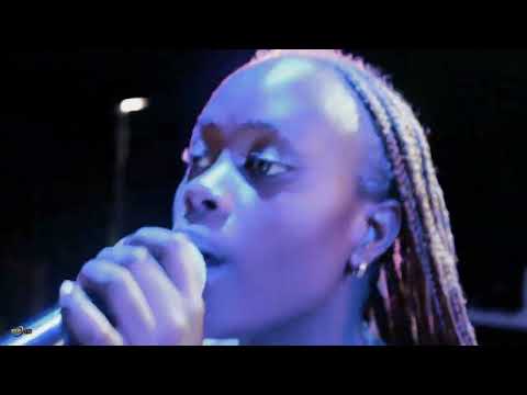 Emma performing  NDI AMAHORO//125 GUSHIMISHA ft Seruka Music Band