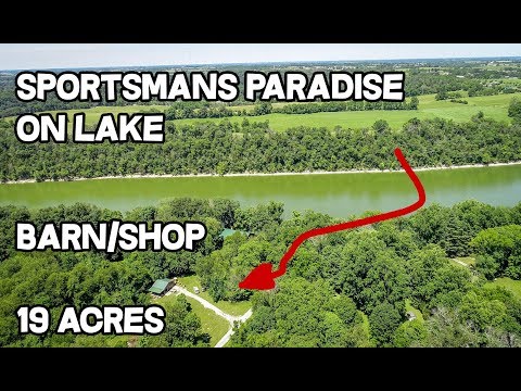 Lake house for sale in Kentucky Sportmans paradise on 19 acres on 2300 acre fishing Lake Herrington