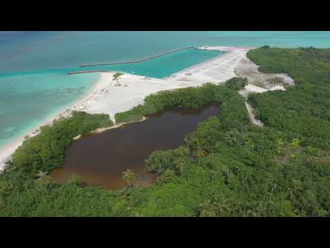 Sunset beach and Harbour of Haa Alif Filladhoo Island
