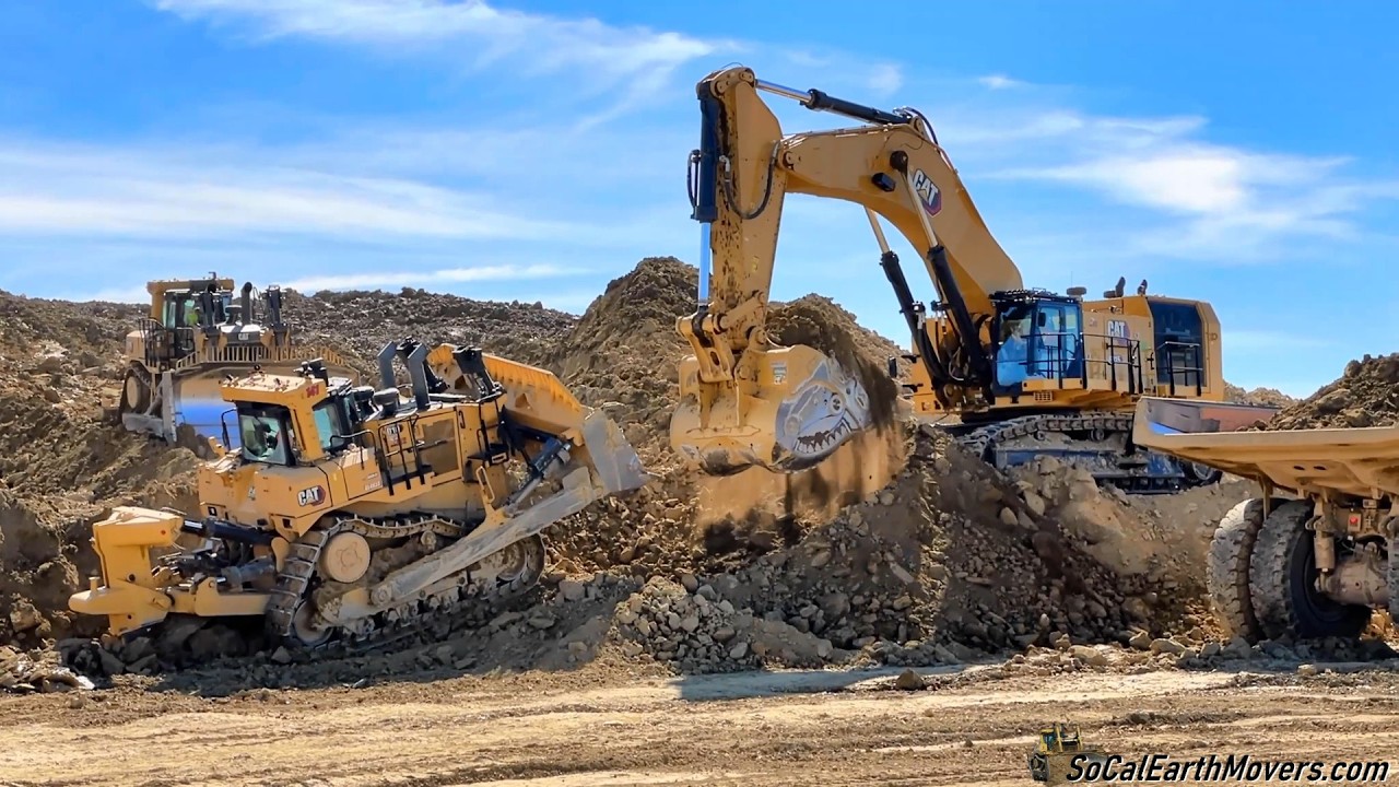 CAT 6015 Excavator loading 777 Haul Trucks with 14.5 cyd Xmor bucket