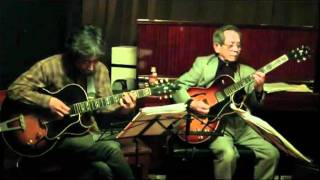The super guitar master Ikuo Shiozaki plays "Satindoll" with his pupil Takayuki Kato