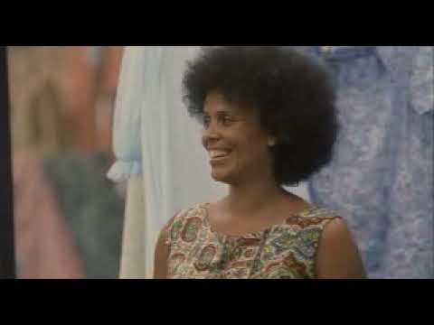 Talk to Me 2007 trailer still — Don Cheadle as Petey Greene behind a radio mic at WOL-AM
