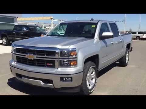 Silver 2015 Chevrolet Silverado Z71 1500 4WD LT Truck at Scougall Motors in Fort Macleod, AB.