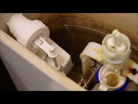 Cieknąca woda w toalecie - naprawa spłuczki / wymiana zaworu napełniającego