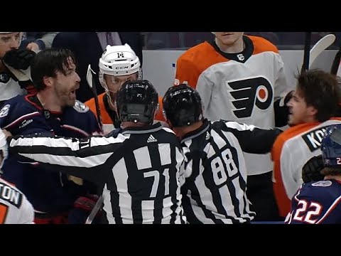 Travis Konecny Sucker Punches Erik Gudbranson While He's Tied Up By Linesman