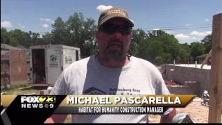 Out-of-state volunteers help build a new home