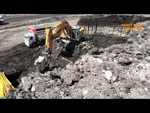 Liebherr R 974C loading coal in trucks