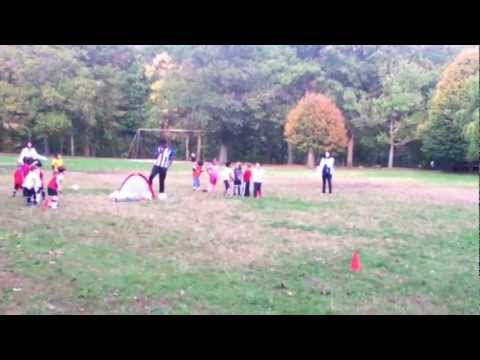 Lucien scoring goals at football training