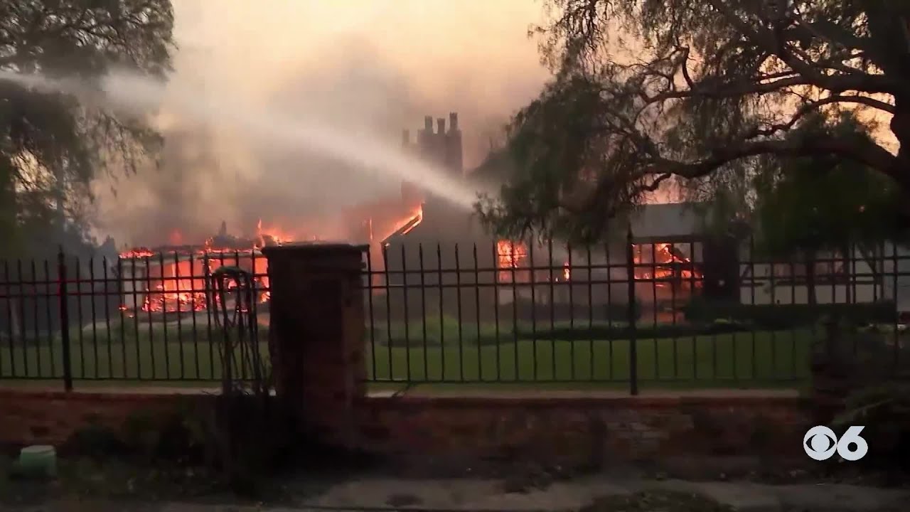 Southern California firefighters make progress against wildfire as fierce winds start to subside