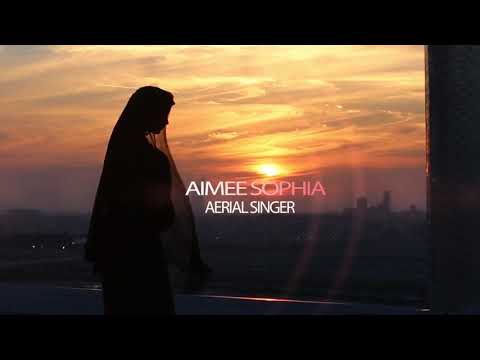 Mario Mira and Aimee Sophia aerial pole singing