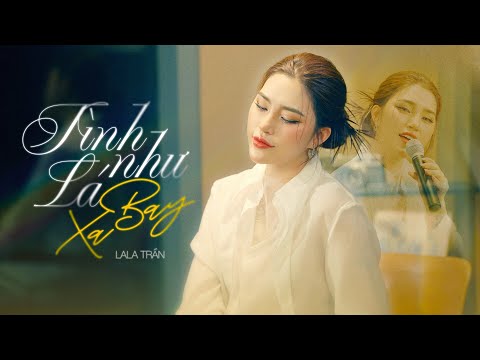 TÌNH NHƯ LÁ BAY XA - LALA TRẦN | Official MV | Tình yêu mới hôm qua nay lạnh lùng băng giá