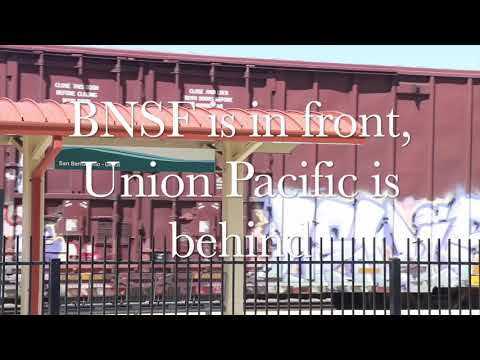Two Freight Trains passing by the San Bernardino Depot