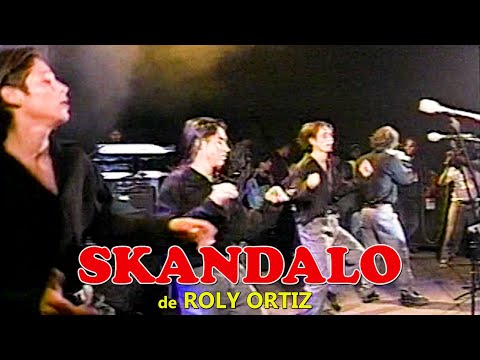 SKANDALO de Roly Ortiz - LAURA