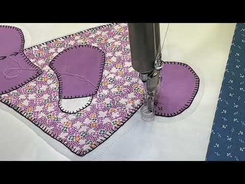 ￼ Free ￼ motion, long arm quilting outlining some sunbonnet Sue’s with my Innova 26