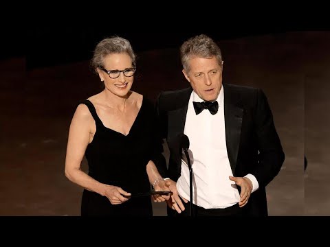 Hugh Grant cracks an odd joke with Andie MacDowell at the 'Four Weddings and a Funeral' reunion...