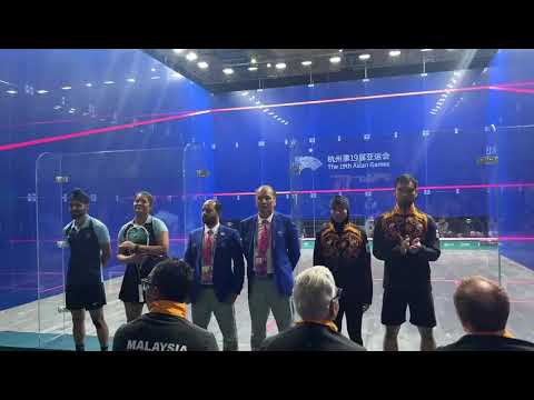 Team India and Team Malaysia compete for the Squash, Mixed Doubles gold medal