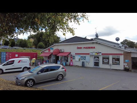 A walk around Örby, a small town in Sweden. Passing residential areas, the cemetery and the Church