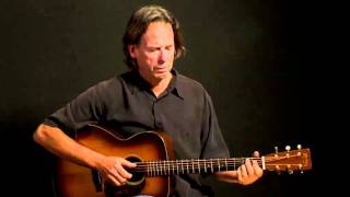 Kenny Sultan playing fingerstyle blues guitar