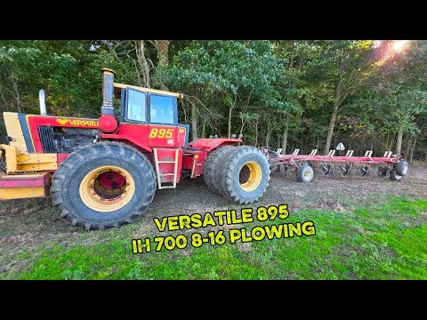 Versatile 895 pulling IH700 8-16 plow