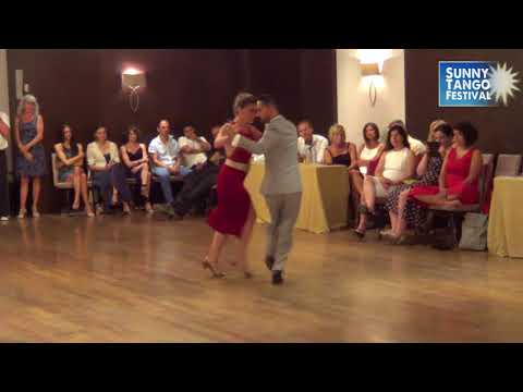  Stefania Colina  and  Juan Martin Carrara  are  dancing  to  a  nontraditional song  at  Sunny Tango Festival  in  2018