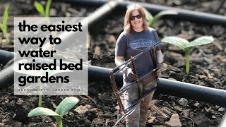 The EASIEST WAY TO WATER RAISED BED GARDENS. How I install GARDEN GRIDS in my garden.