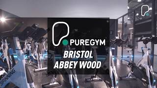 PureGym Bristol Abbey Wood Retail Park: Gym studio with functional training rig, green turf area, weights racks, mirrors.