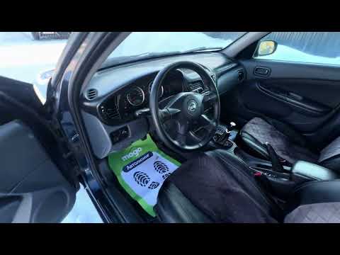 фото nissan almera ii (n16) рестайлинг 0