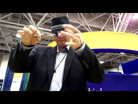 Trade show booth magician stops crowds!