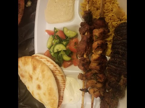 Middle Eastern Meal, Kebabs Hummus Salad and Rice