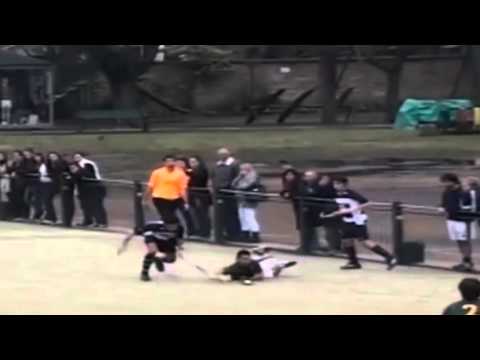 One of the best spins that you will ever see: from the ground and between two players