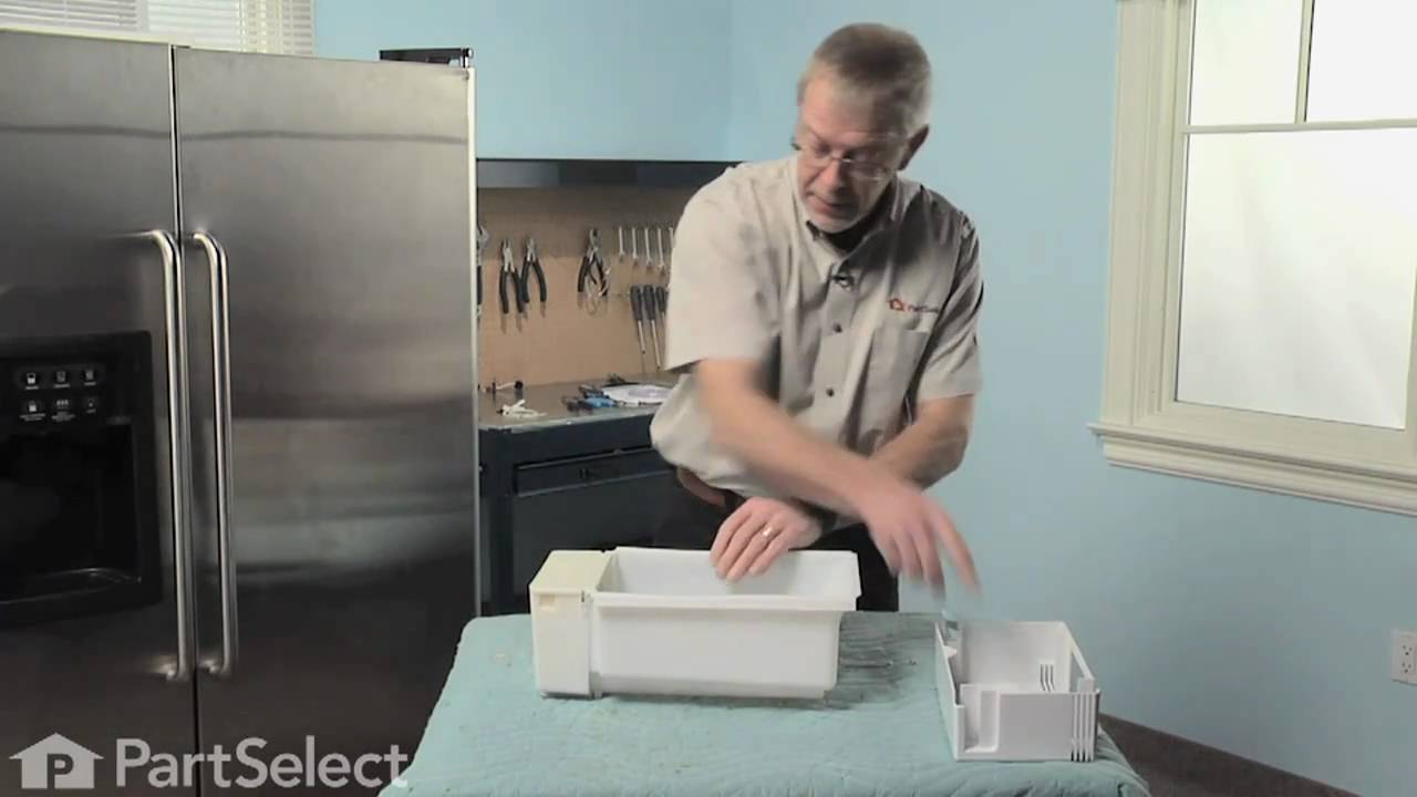 Replacing your General Electric Refrigerator Dispenser Crusher Cover Replacing your General Electric Refrigerator Dispenser Crusher Cover