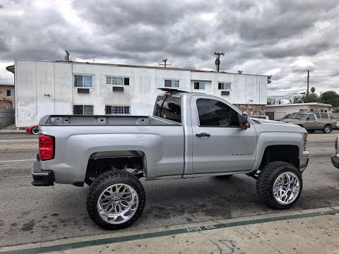 LIFTED SILVERADO ON 22X14 FUEL FORGED WHEELS