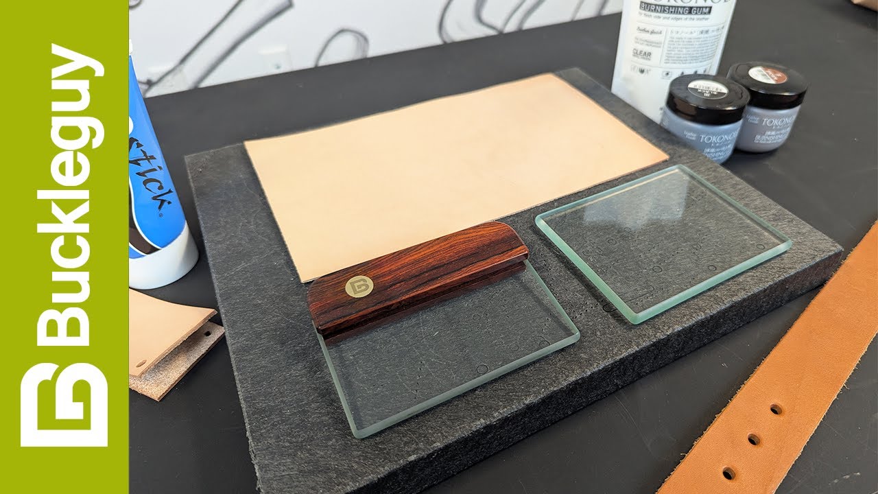 What are glass slickers used for in leathercraft?