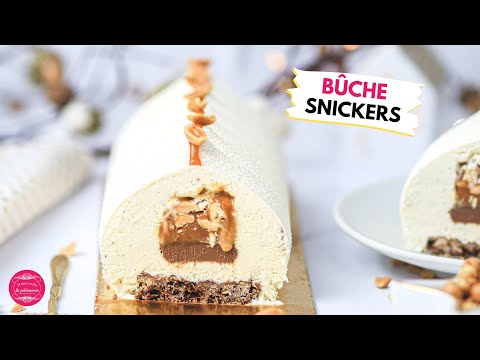 Snickers-style Yule Log with vanilla, peanut, caramel and chocolate