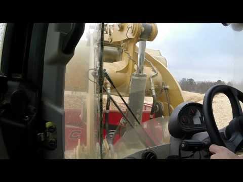 Feeding the EC366 Rotochopper