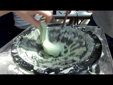 Corn Starch on a Speaker Cone - A Fluid Dynamics Optical Illusion?