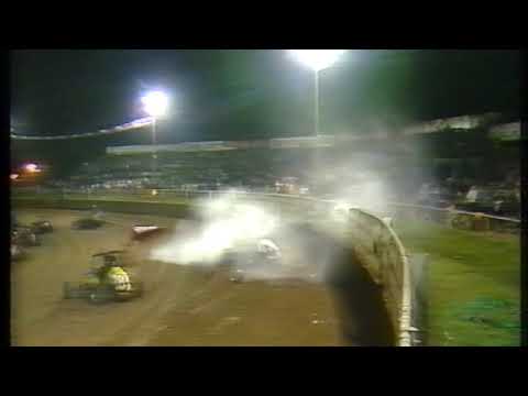 1984/85 Ron Gates rolls over Dean Hogarth and bursts the water pipe at the top of the fence