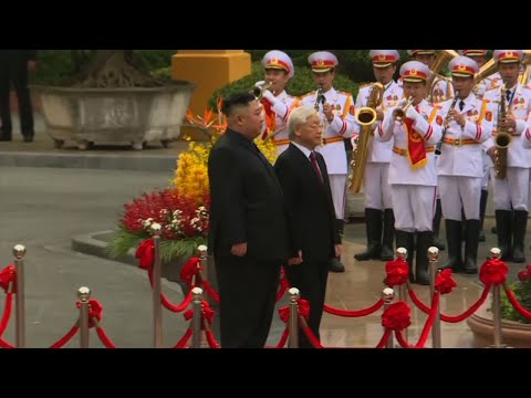 A day after his stunning summit breakdown with Donald Trump, North Korean leader Kim Jong Un smiled broadly as he strode down a red carpet with Vietnam's president, a military band playing as stiff-backed soldiers goose-stepped by. (March 1)