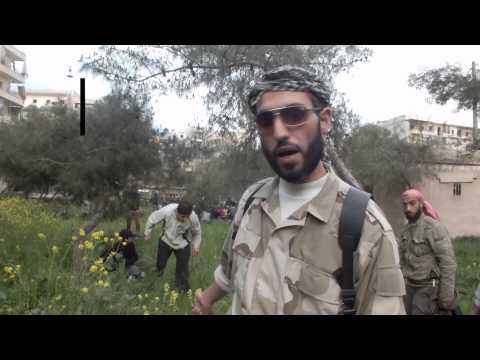 مقابلة مع قائد لواء السلام مصطفى برو أبو قتيبة خلال دفن أحد الشهداء في حي صلاح الدين في حلب