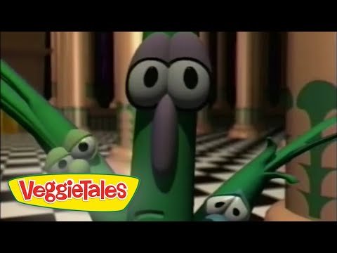 Larry the cucumber with wide eyes and raised arms in a checkerboard hallway; VeggieTales logo in the corner.