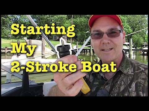 Starting the Evinrude 90 HP 2 stroke outboard boat engine.