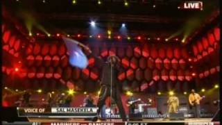 K&#39;naan waves the Somali flag (World Cup 2010 opening)